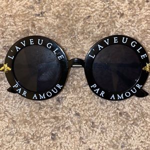 Amour round sunglasses